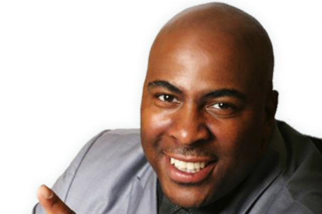Capone performing at the Improv Comedy Club